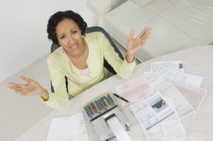 Cost Frustrated Lady With House Expenses Shutterstock 120499132 (7)